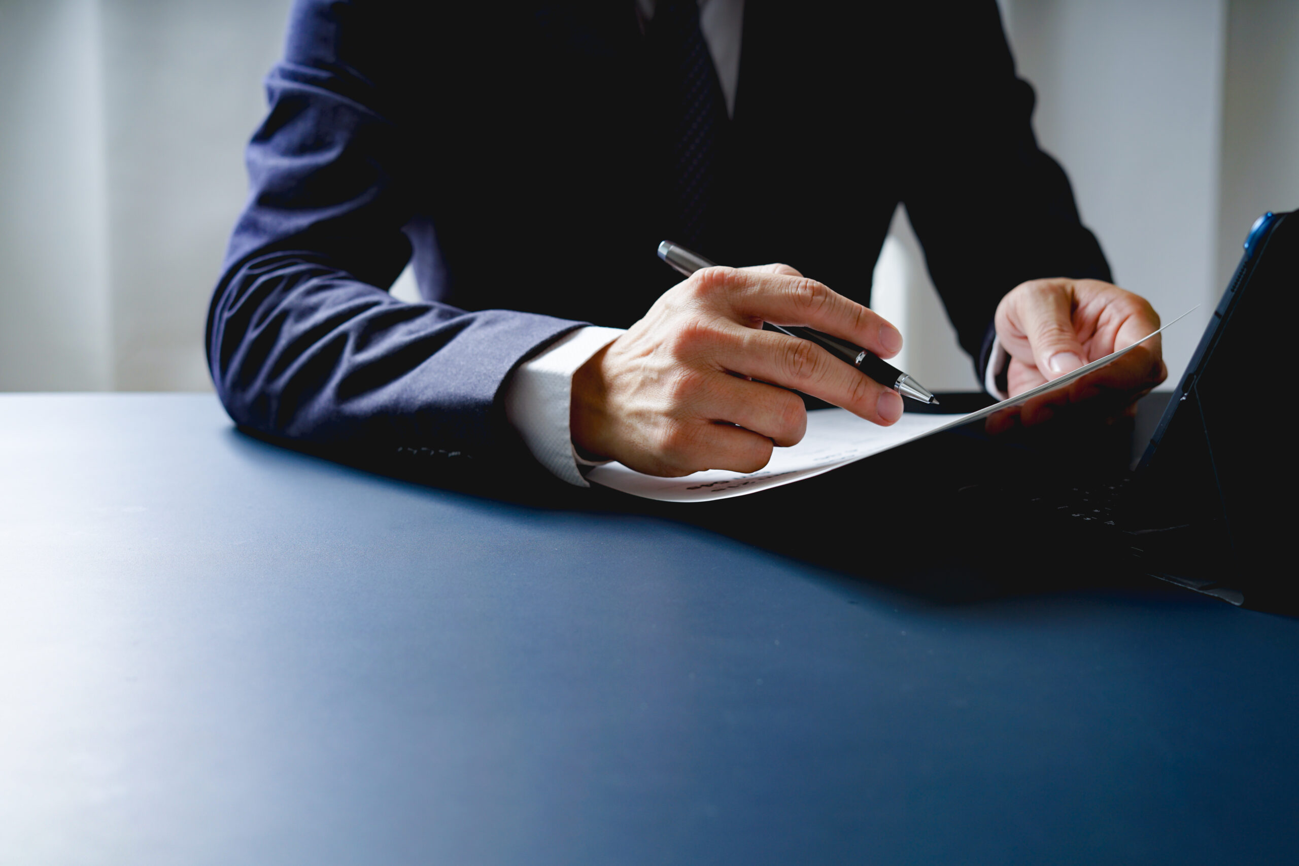 Businessman doing finances and calculate about cost to investmen