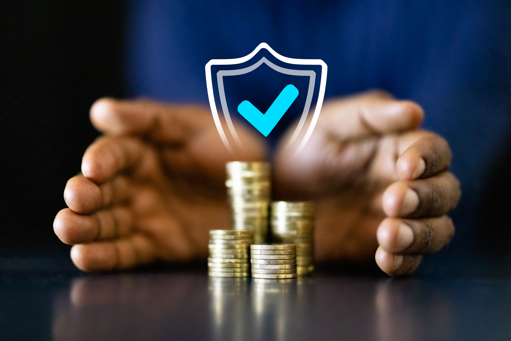 African American businessman counting coins to protect income and invest